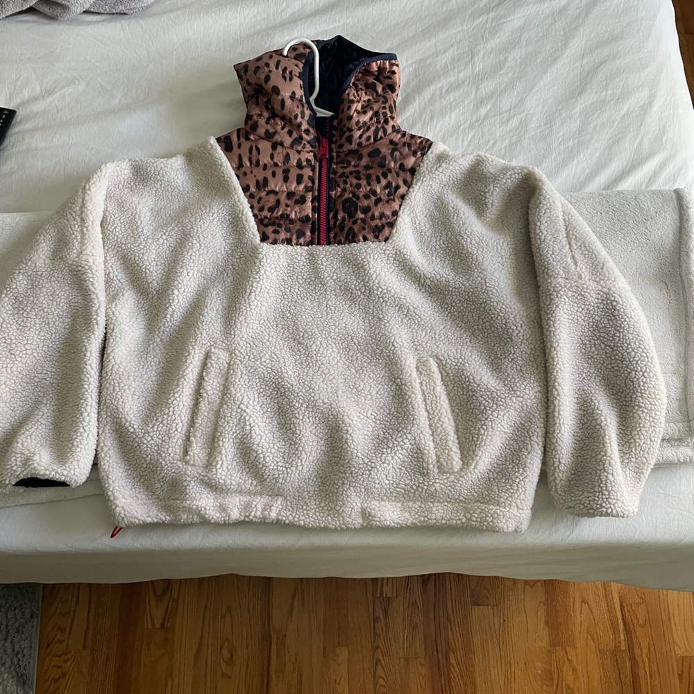 White Sherpa quarter zipwith cheetah detailing